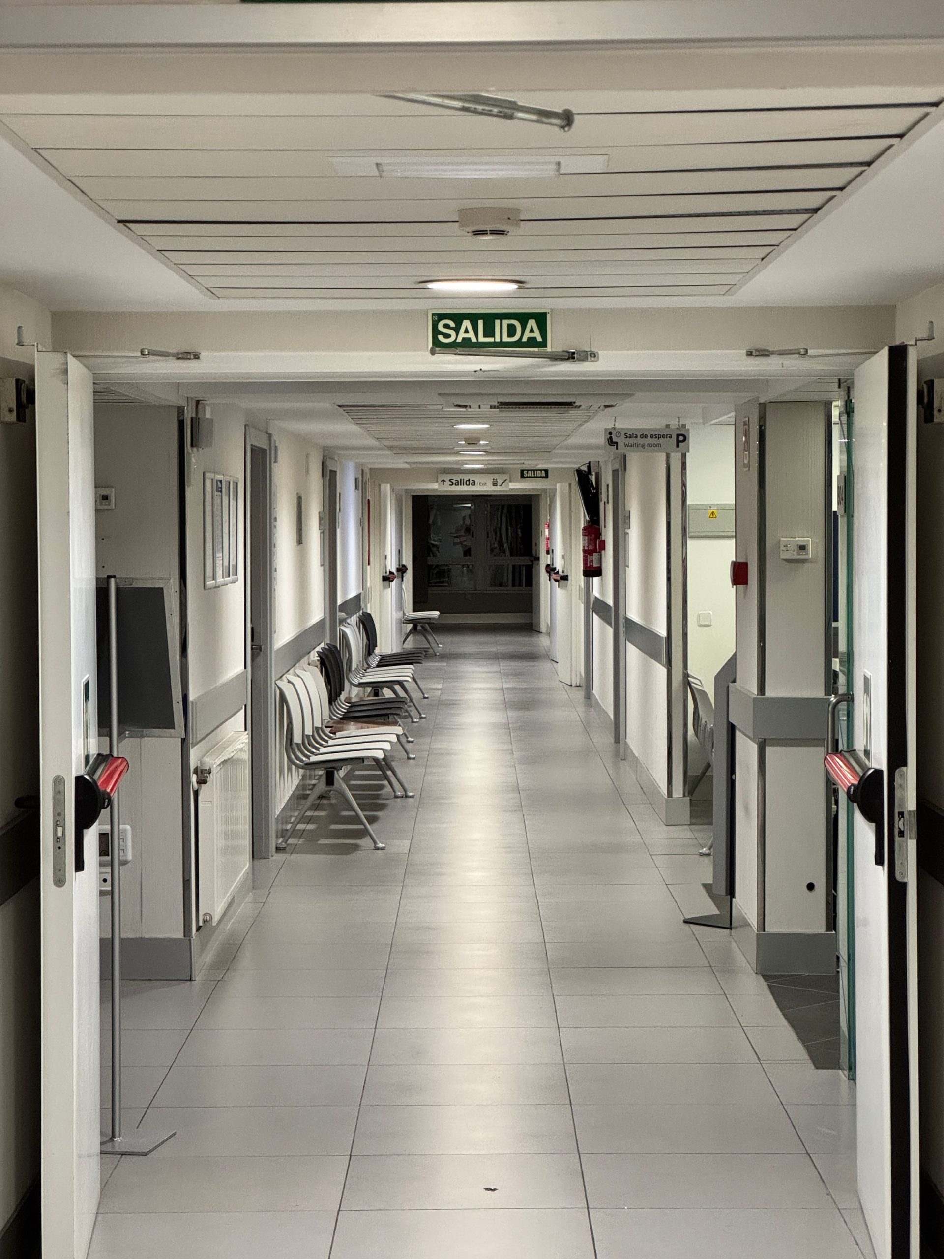 Clean hospital corridor with resilient commercial flooring