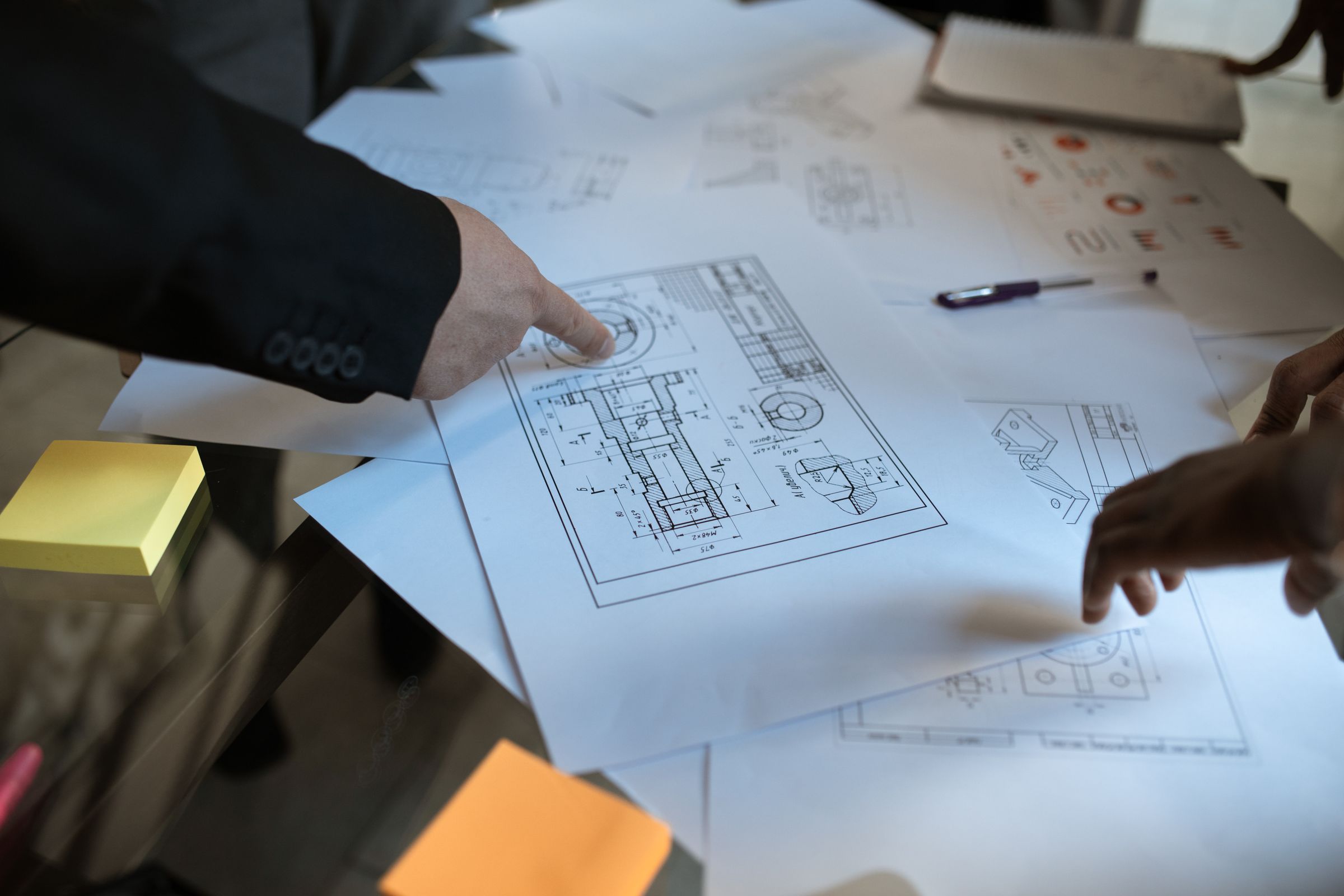 Project plan and blueprint discussion for commercial flooring cost planning