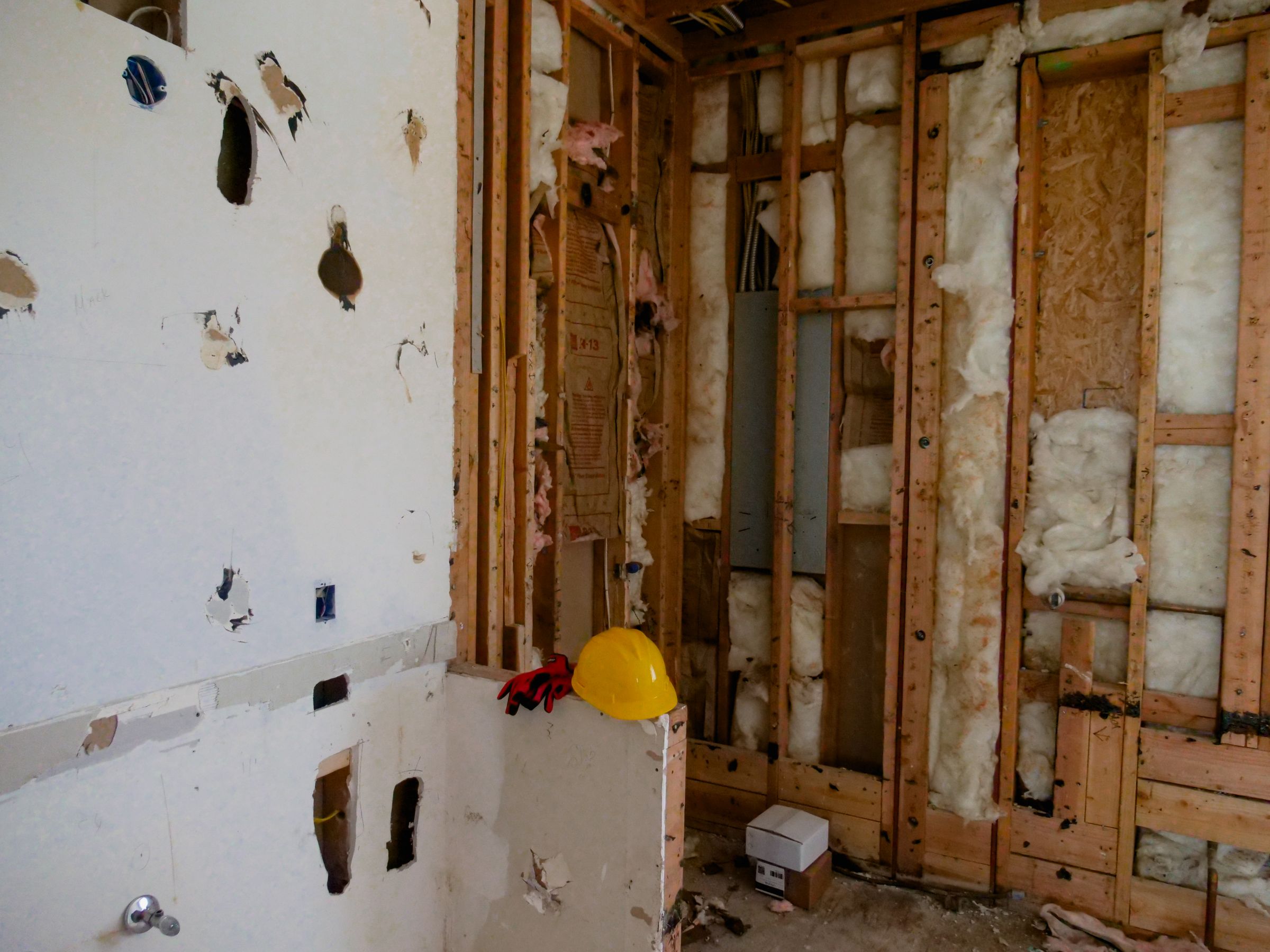 Interior space under demolition before flooring replacement
