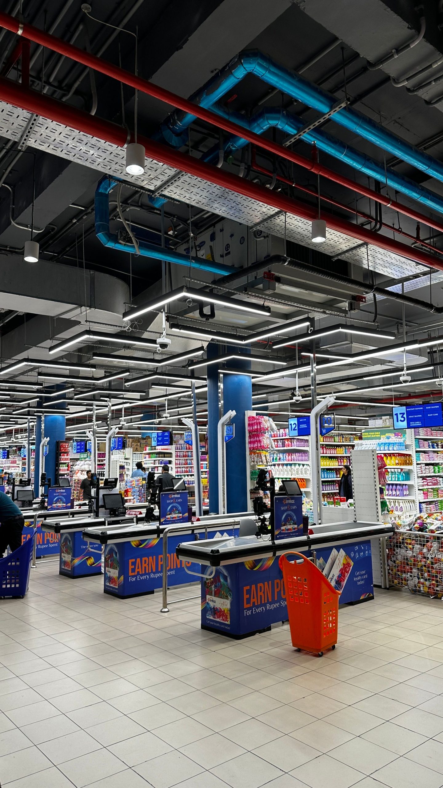 Modern supermarket interior with commercial retail flooring