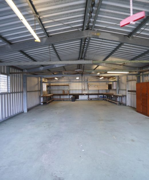 Empty industrial space with concrete floor
