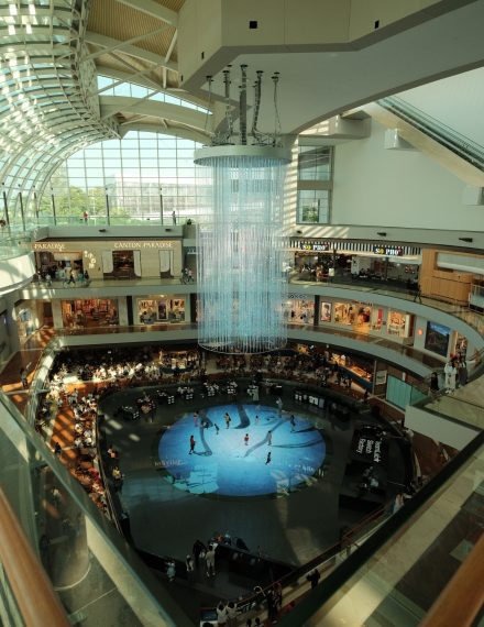 Spacious shopping mall interior with finished commercial flooring